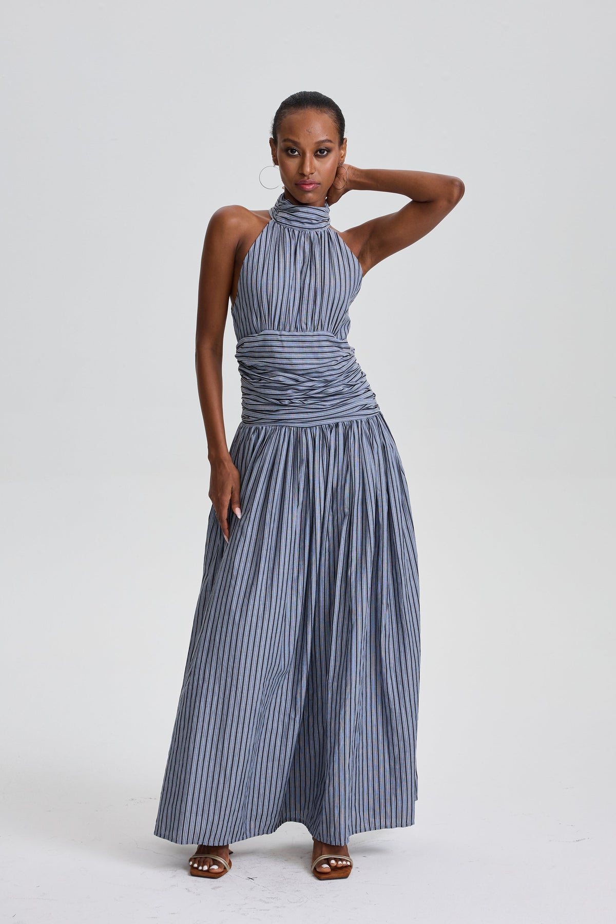 Marwen Vertical Stripe Halter Neck Ruched Waist Flared Maxi Dress – Feysis